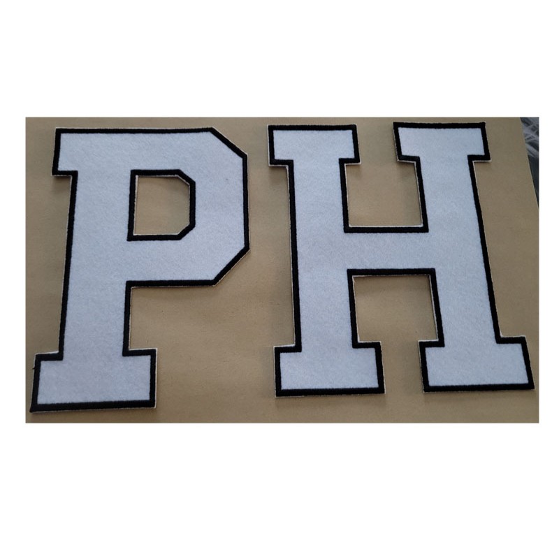 Huopamateriaali irtokirjain/numero