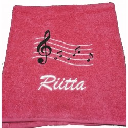 Brodeerattu nuottiaiheinen pyyhe